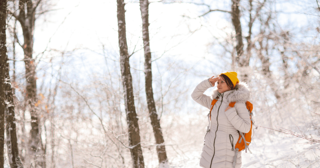 Woman hiking on a winter day.