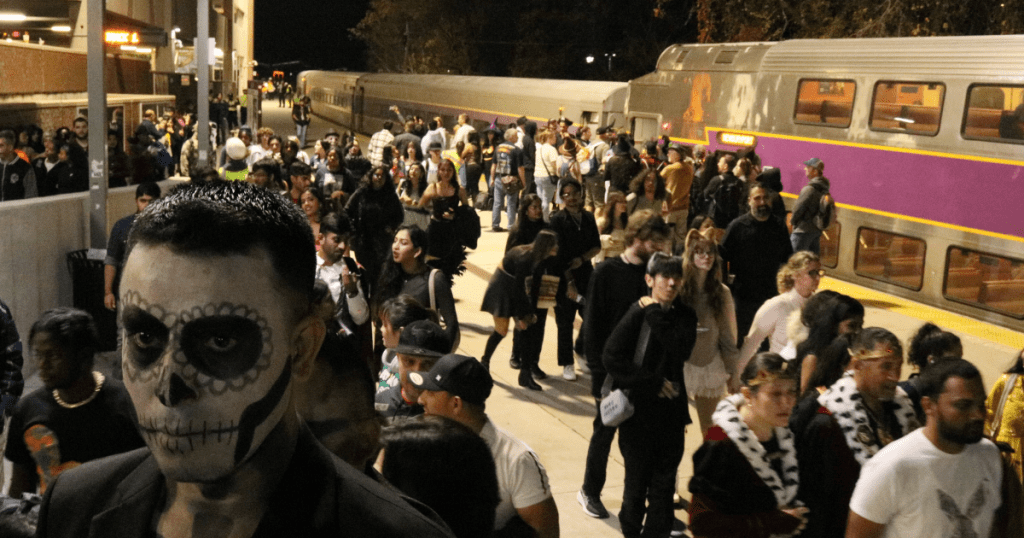 Crowds of costumed people celebrating Halloween in Salem, MA