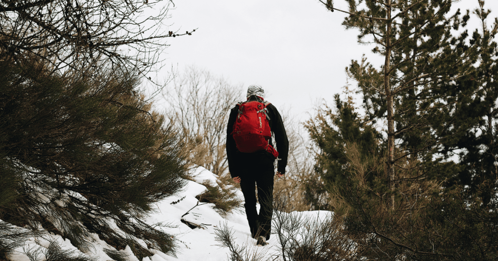 Hiking through the snow.