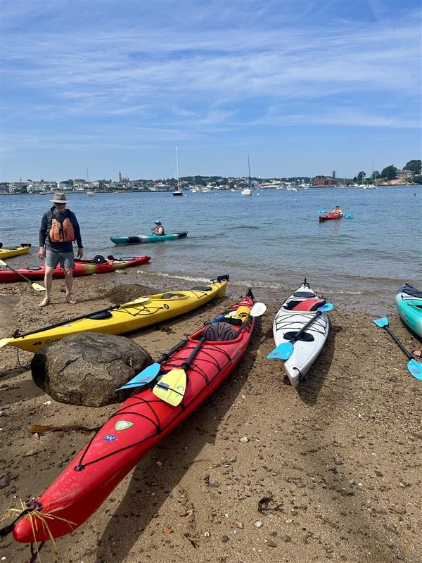 Kayaks beached at Ten Pound Island in Gloucester, MA