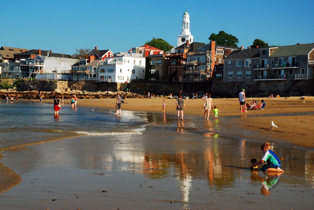  Children playing at Front Beach in Rockport, MA on Summer afternoon 