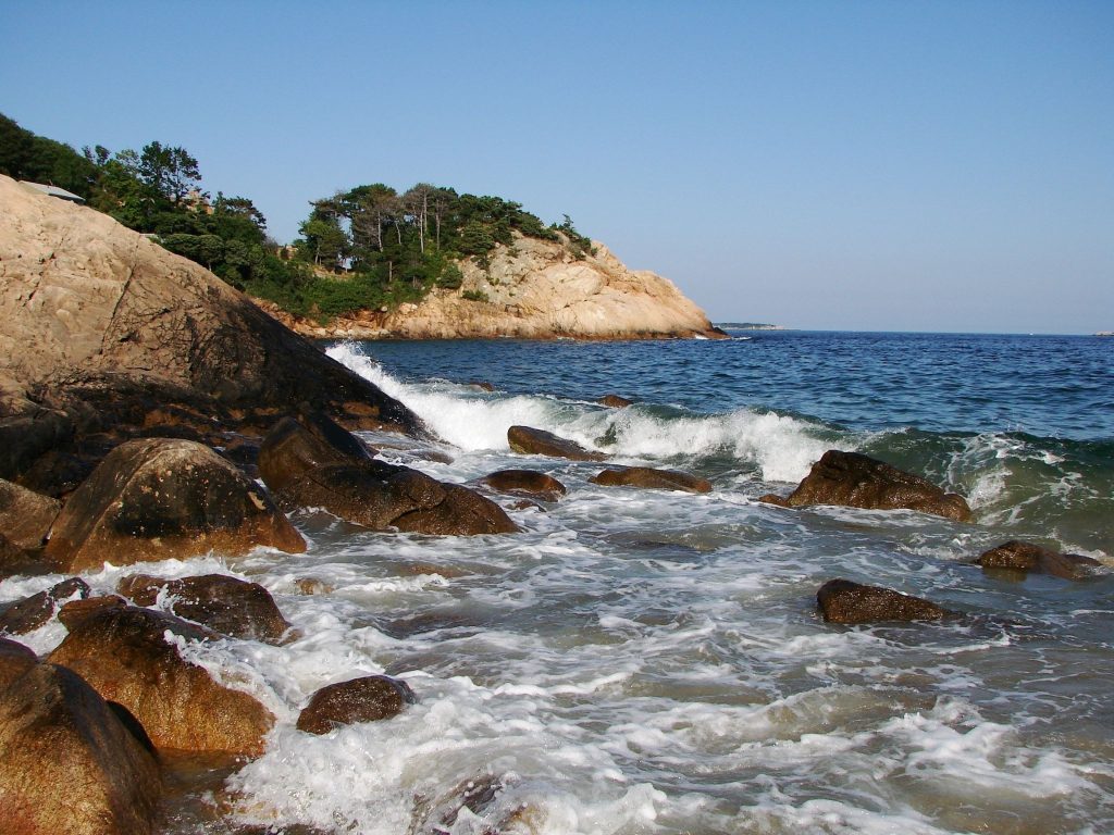 Waves crashing on to the rocks off of Singing Beach in Manchester-by the-sea, MA 

