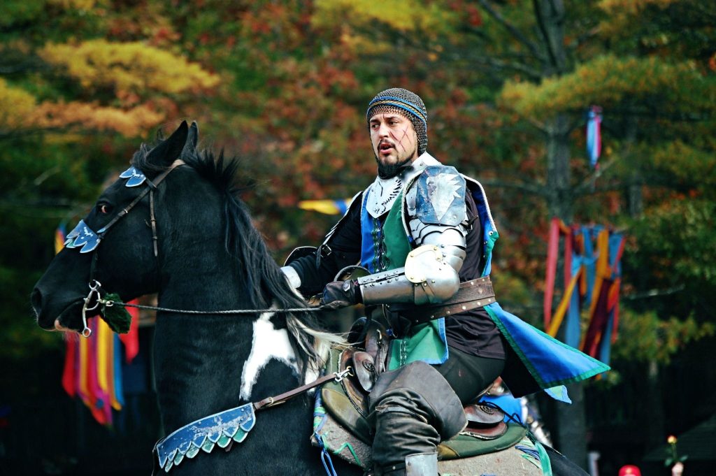 A costumed knight on horseback performing at King Richard’s Faire in Carver, Massachusetts.