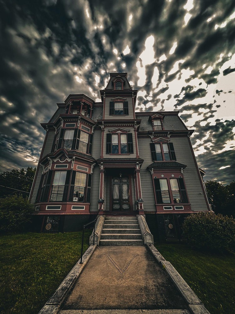 View of the SK Pierce House in Gardner, MA at dusk during Halloween time