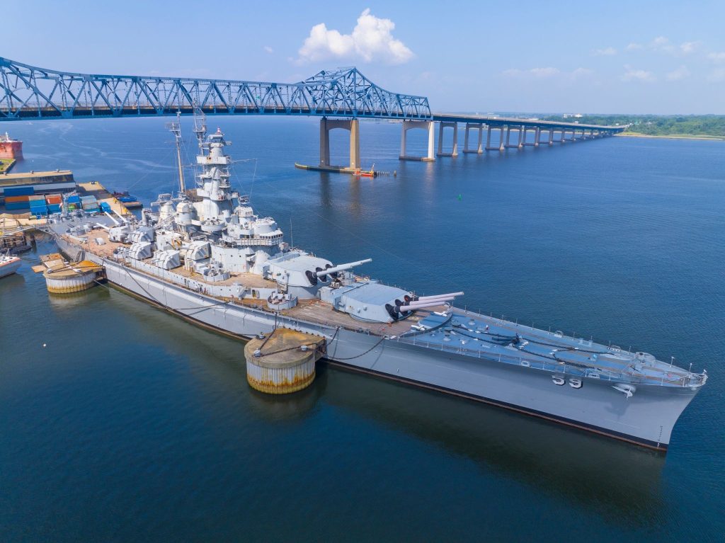 Aerial view of Battleship Cove in Fall River, MA, on a clear sunny day